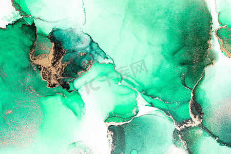 绿色背景水墨摄影照片_大理石液体水墨艺术画在纸上的绿色金色抽象背景。