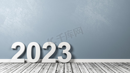 2023年摄影照片_2023年数字文本在木地板上靠墙