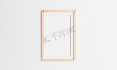 相框模版摄影照片_白色墙壁背景上挂着的木制相框。 