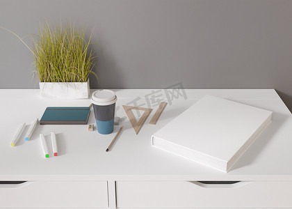桌子书籍摄影照片_白色的书封面模拟在白色的桌子上。