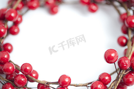 喜庆红色边框摄影照片_喜庆红色圣诞浆果的边框或框架