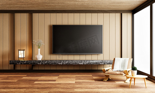 现代电视背景墙摄影照片_在现代空荡荡的房间里，黑色大理石台面上方的电视上铺着木制背景的椅子植物地毯。
