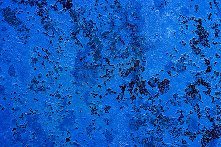 破旧墙面背景摄影照片_生锈的破旧蓝色墙面。