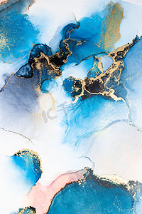 液体流体摄影照片_大理石液体水墨艺术画在纸上的豪华蓝色抽象背景。