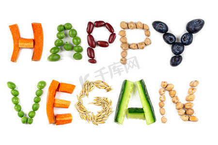 薪资福利摄影照片_HAPPY VEGAN-蔬菜题词