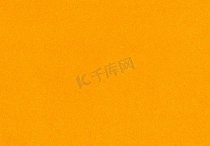 高度详细的放大特写明亮、霓虹橙色无涂层纸张纹理背景扫描，带有细粒纤维颗粒，带有用于模型或高分辨率壁纸的文本复制空间