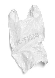 污染塑料袋摄影照片_塑料袋白色购物携带污染环境废物使用购物手柄零售一次性