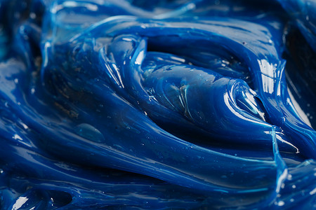 高温工作摄影照片_润滑脂，蓝色优质合成锂复合润滑脂，适用于汽车和工业的高温和机械润滑。