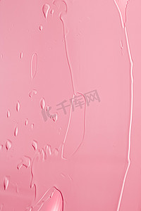 粉色唇膏或唇彩质地作为化妆品背景、化妆品和美容化妆品产品，用于奢侈品牌、假日平面背景或抽象墙艺术和绘画笔触
