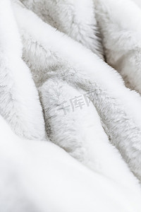 豪华白色毛皮大衣纹理背景，人造织物细节