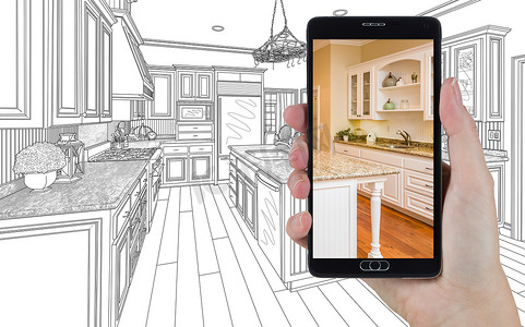 手持智能手机显示厨房绘图照片