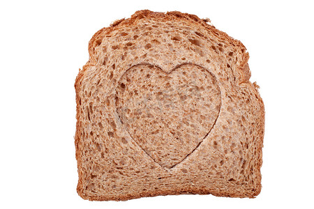 能量包摄影照片_一片面包上有心形的洞