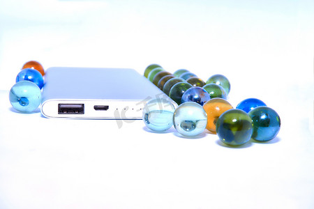 便携式摄影照片_具有多色玻璃球的便携式蓝色硬盘存储器
