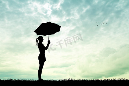 雨中撑伞摄影照片_雨中撑着伞的女孩