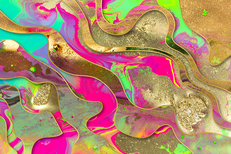 流动荧光墨水抽象背景上的金尘斑点和波浪线