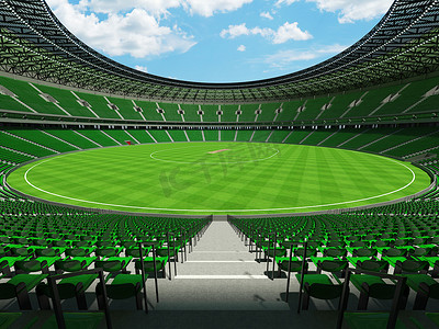 美丽的现代大型圆形板球场，配有绿色座椅和 VIP 包厢