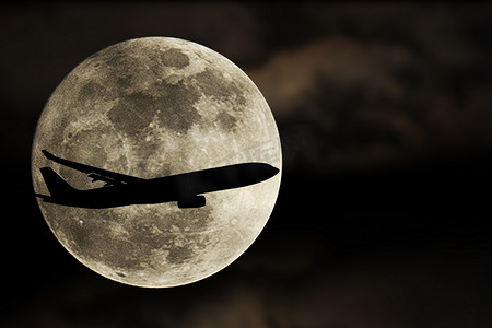 月亮飞机摄影照片_飞机和超级月亮、满月的剪影