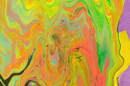 抽象的绿色和粉红色波浪混合墨水纹理。