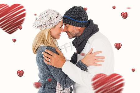 冬季时尚拥抱中幸福情侣的复合形象