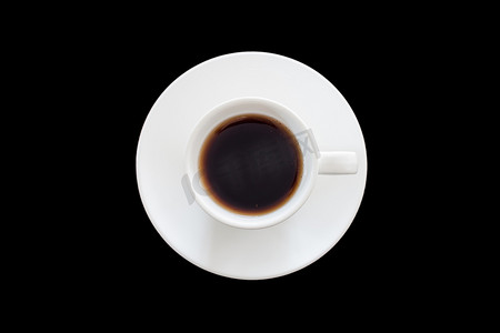 黑色杯子上摄影照片_黑色背景上一杯新鲜浓缩咖啡的顶部视图