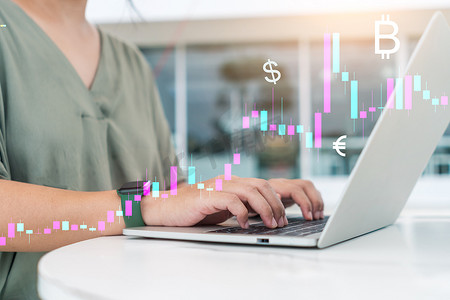 经济学图标摄影照片_Fintech 金融图标和市场股票图在计算机屏幕监视器中弹出，手指指向。