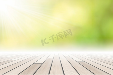 木地板场景背景绿色散景与阳光