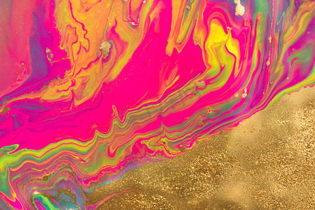 液体荧光涂料背景上的金粉斑点。