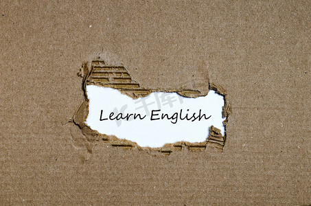 这个词出现在撕破的纸后面学习英语