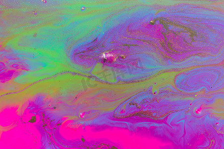 粉色流体渐变摄影照片_粉色、蓝色和绿色生动的渐变背景。
