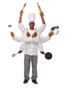 黑人厨师摄影照片_多任务处理是一种厨师游戏。