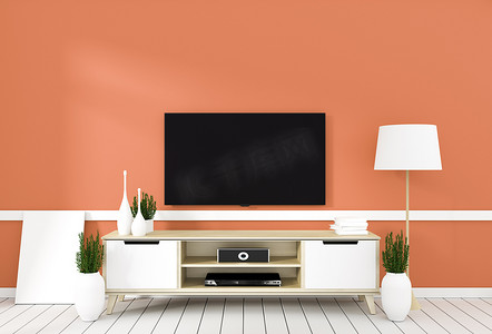 带抽屉电视柜摄影照片_橙色现代房间的电视柜，简约设计，禅宗风格。 