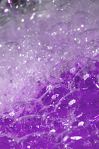 泡泡云摄影照片_沐浴水气泡泡沫背景的特写