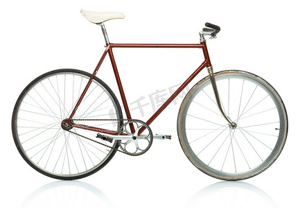 刹车踏板摄影照片_时尚时髦自行车-固定齿轮隔离在白色