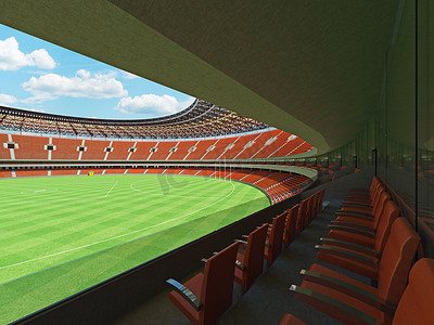 美丽的现代圆形澳大利亚规则足球场，配有橙色座位和 VIP 包厢