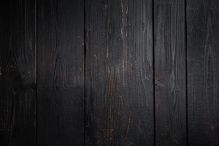Grunge 纹理背景，顶视图平躺，带有文本或食物黑色木桌背景的复制空间