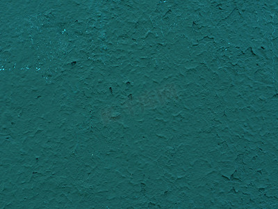 墙上不均匀的绿色灰泥抽象背景。