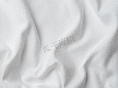 棉质纹理摄影照片_白色棉质针织面料质地