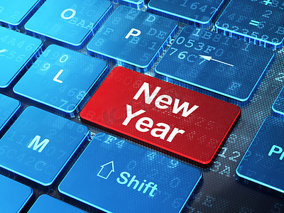 新年按钮摄影照片_假日概念：电脑键盘背景上的新年