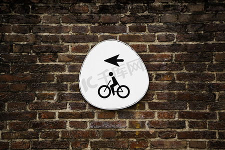 交通箭头摄影照片_带箭头的自行车标志