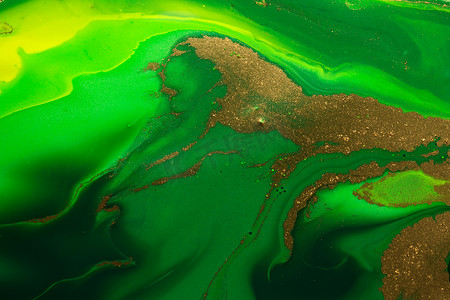 图案波点摄影照片_液体绿波抽象背景上的金点。