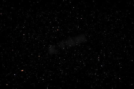 宇宙的星星摄影照片_夜空背景中的星星纹理银河系的星星辉光。