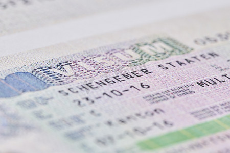 申根签证摄影照片_护照上的申根签证。