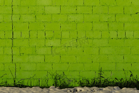 扁平纹理摄影照片_绿色石膏粗砖外墙纹理