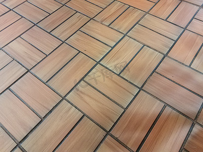 地板或地面上的棕色砖矩形瓷砖图案
