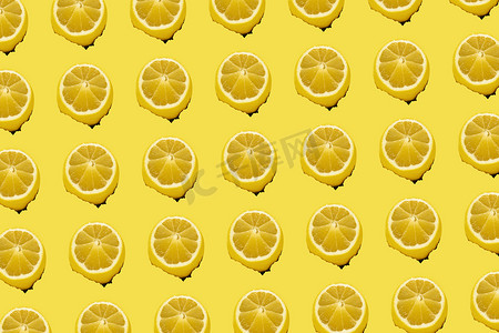 黄色背景和柠檬上的破洞图案