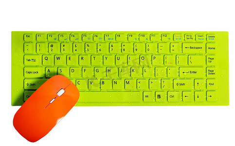 鼠标符号摄影照片_橙色电脑鼠标绿色按钮键