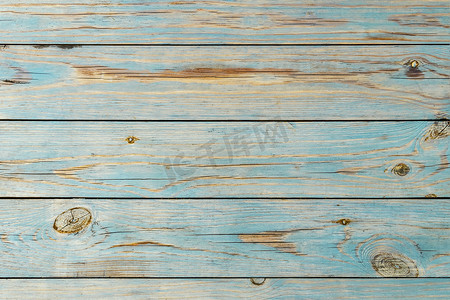 蓝色木板背景摄影照片_褪色的蓝色木板背景
