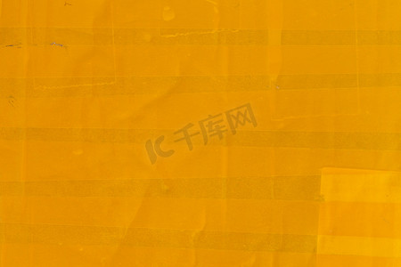 黄色胶带包裹平面纹理和特写背景