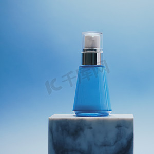 蓝色背景中的血清瓶、豪华护肤品、美容和化妆品