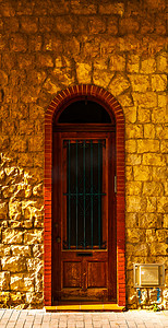 文化质感摄影照片_具有有趣质感的旧门，建筑元素，有趣的建筑入口，复古风格